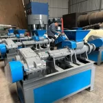 charcoal briquette machine in factory